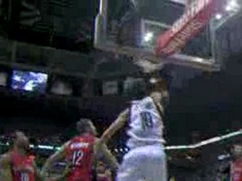 NBA Carlos Delfino throws down a big one-hand jam over the R