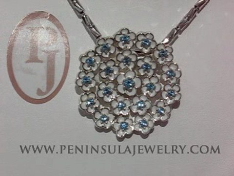 Sterling Silver Flower Pendant with Blue Topaz