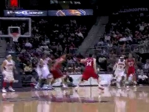 NBA Josh Smith blocks Devin Harris' shot, runs the floor and