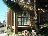 Ossature bois: Extension contemporaine  maison de pierre