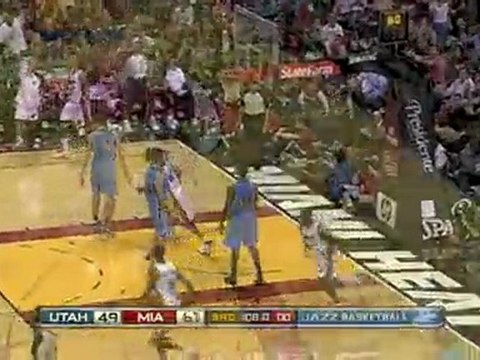 NBA Dwyane Wade drives right through the Jazz and throws dow