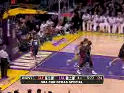NBA Kobe Bryant finds a trailing Pau Gasol in the paint for