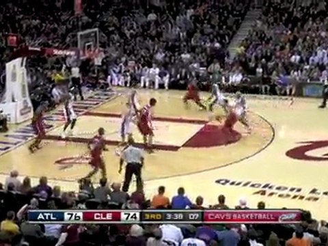 NBA Mike Bibby connects with Josh Smith for the nice dunk.