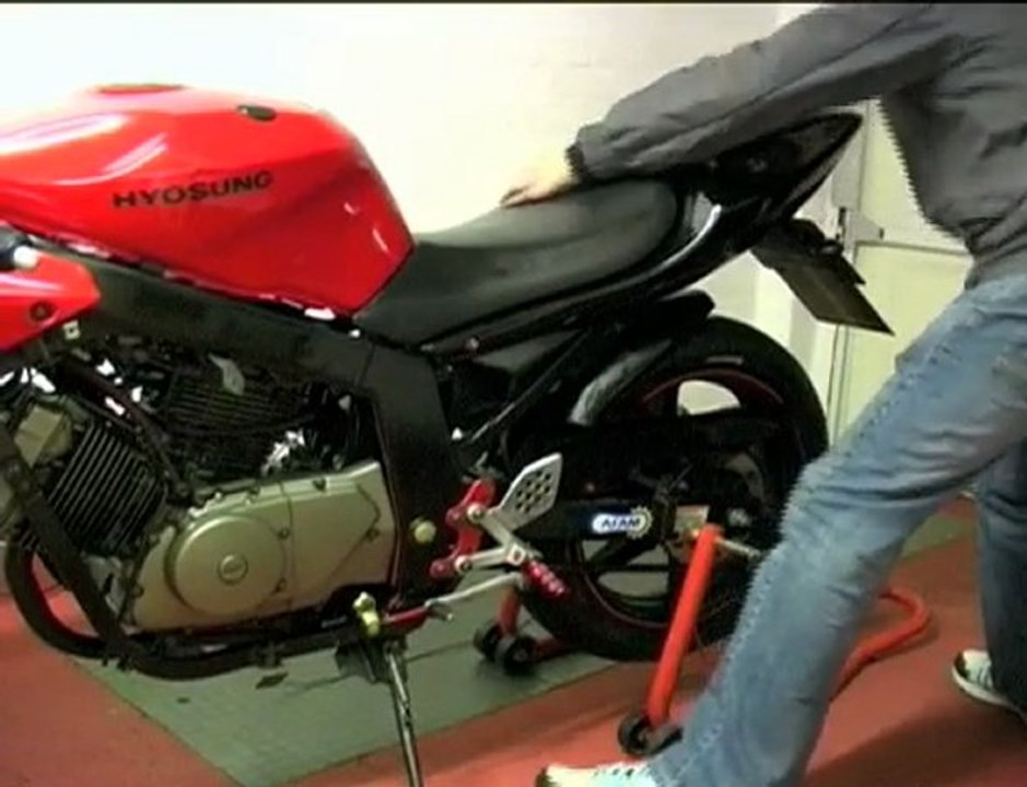 Using a motorcycle paddock stand