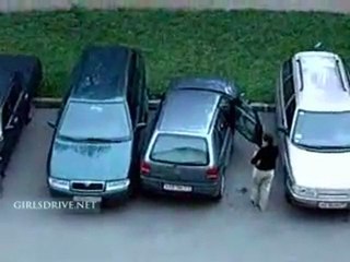 Woman stuck while parking her car