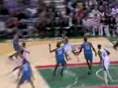NBA Brandon Jennings throws a nice pass to Hakim Warrick, wh