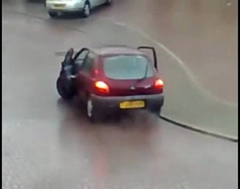 Car Ice Skating UK Lucky Accident People Jump Out Very Funny