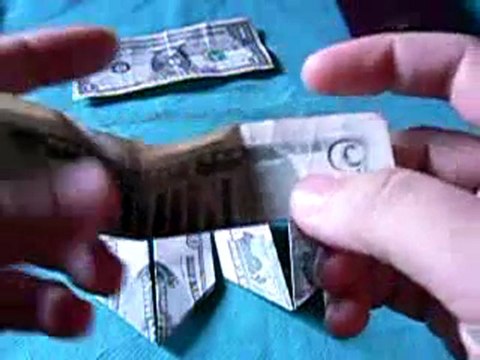 Complot illuminati Dollars Pliés