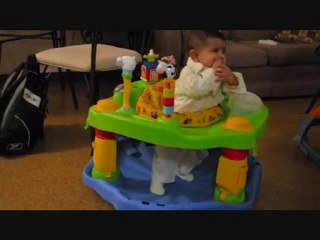 Playing in exersaucer