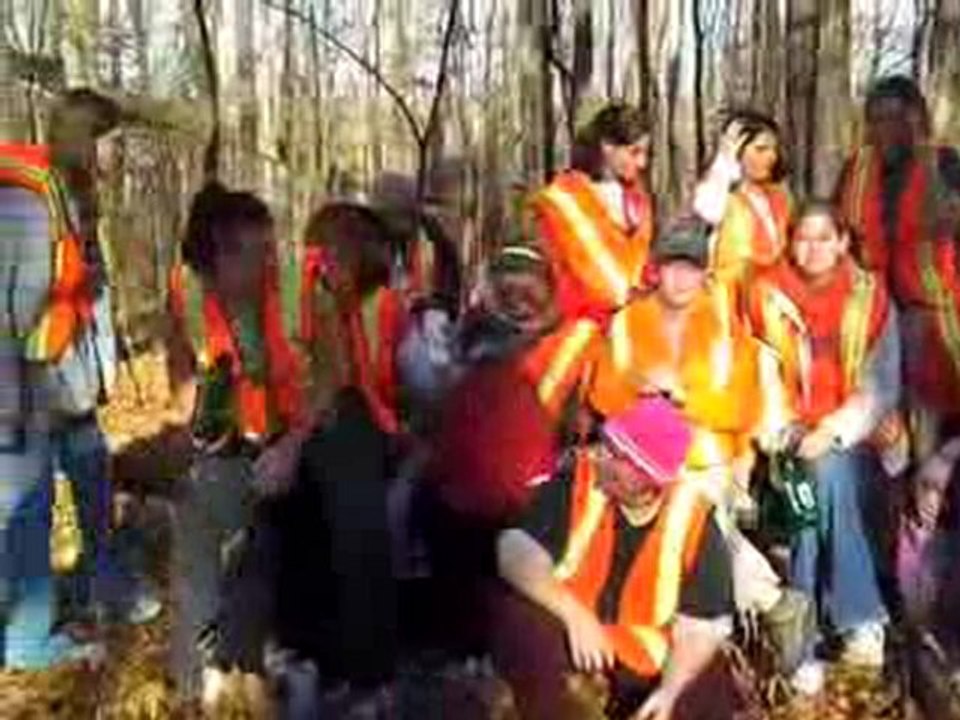Video of MLC girls walking up a hill w/more than one tree!