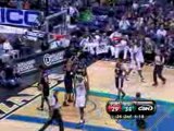 Antawn Jamison drives down low and comes up with the hoop an