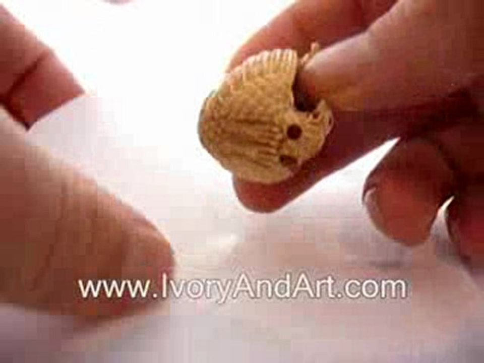 Mammoth ivory netsuke - Fairy Playing Flute on a Chicken