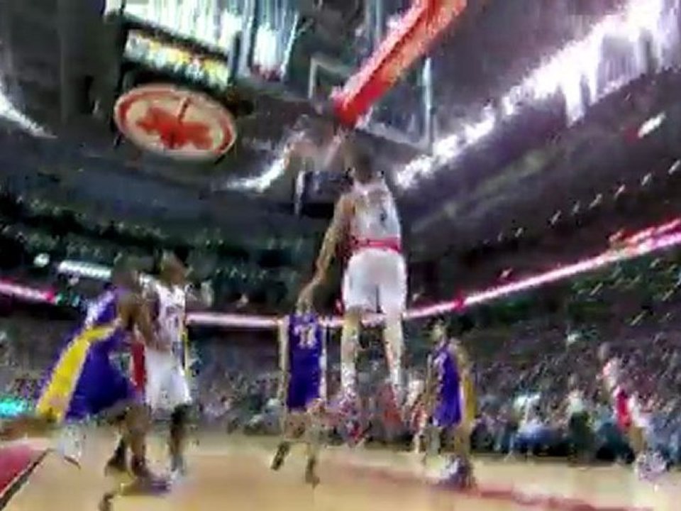 Andrea Bargnani drives the lane and completes the play with