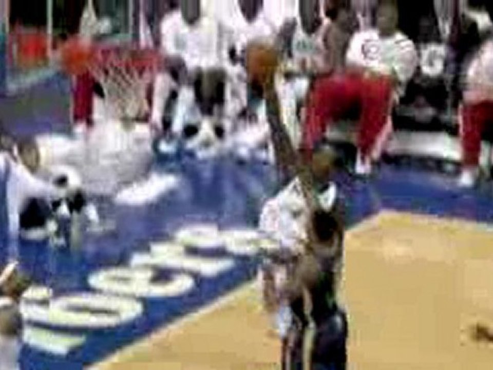 Samuel Dalembert steps up and blocks this Brandon Rush shot