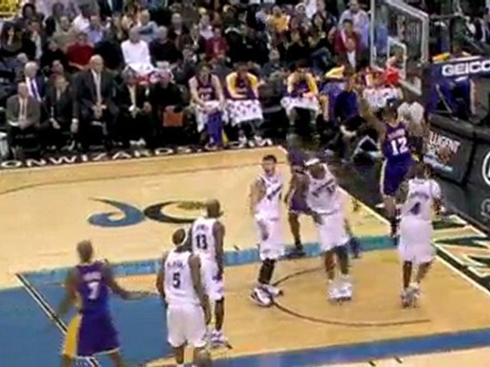 Shannon Brown soars to grab the rebound and throw down the d