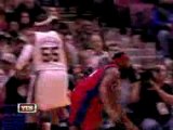 Brook Lopez goes up on Baron Davis and gets the nasty block.