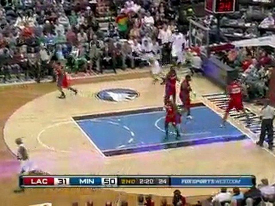Jonny Flynn gives the nice assist to Kevin Love down low.