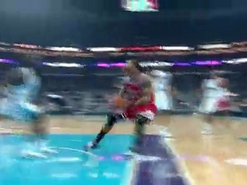 Derrick Rose drives the lane and finishes with a two- handed