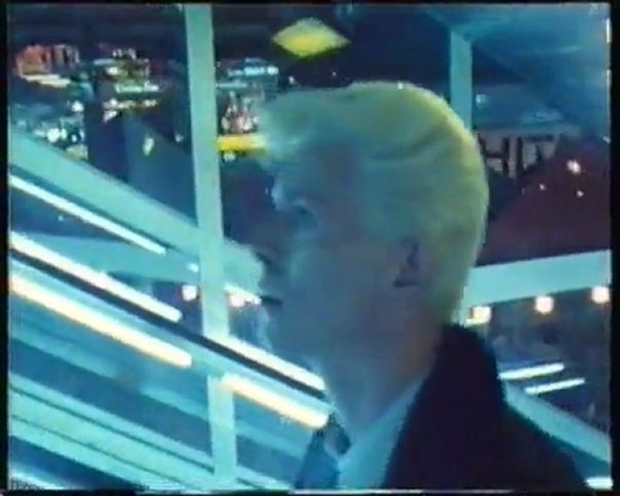 David Bowie on a escalator ride in Singapore