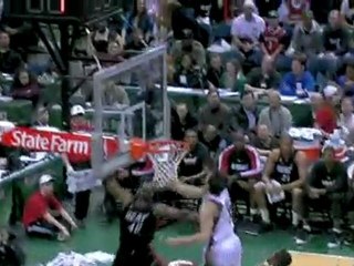 Andrew Bogut sends back the runner down the lane.