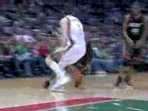 Dwyane Wade rises up and throws it down.