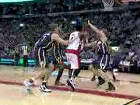 Chris Bosh tips the rebound to himself and throws down the h