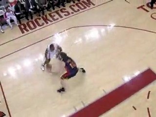 Trevor Ariza hits the step back jumper over Coby Karl.