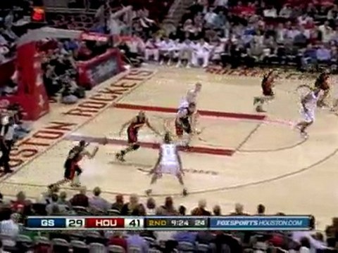 Monta Ellis blocks Trevor Ariza's shot and is able to keep t