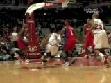 Derrick Rose drives through the lane and makes the nice up-a