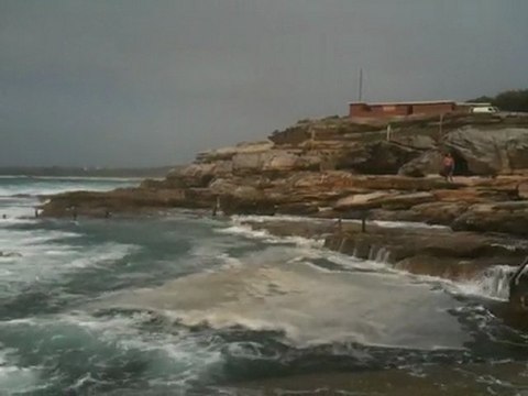Waves flood rockpool at Maroubra beach in Sydney
