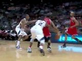 Derrick Rose spins past a defender and finishes with authori