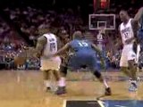 Jameer Nelson drives past a defender, gets fouled and sinks