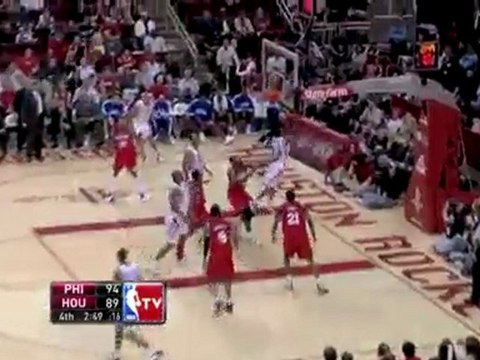 Aaron Brooks drives and spins right by Thaddeus Young on his