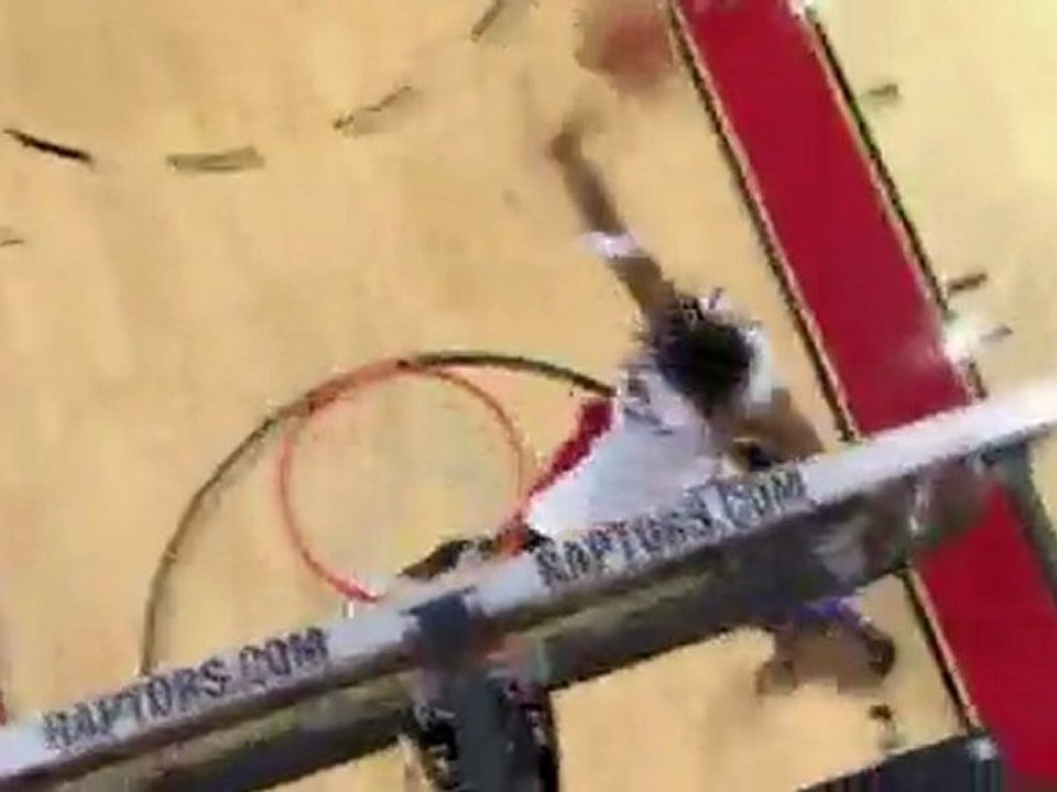 Chris Bosh denies Jason Thompson's layup with a big block of