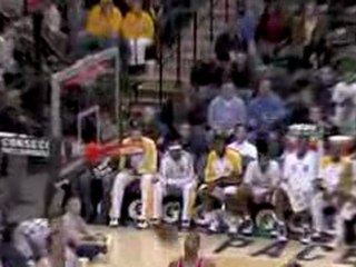 Earl Watson has the ball tipped away from him, but he gather