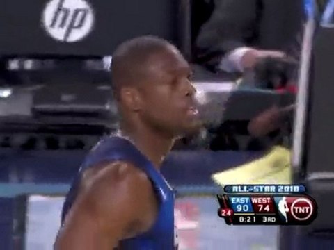 Dwyane Wade throws the alley-oop to the Orlando Magic's Dwig