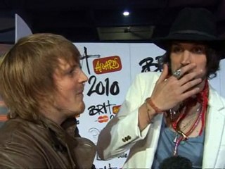 Kasabian backstage at the Brits 2010