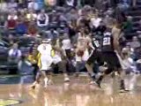 Manu Ginobili drives through the lane and gets the bucket pl