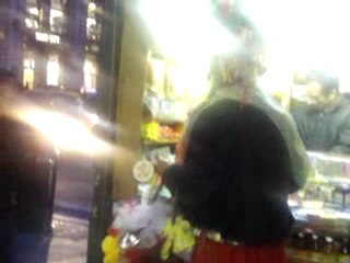 Colorful dude at newsstand on 23rd/6th