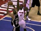 Ben Wallace blocks Tim Duncan's shot during the first quarte