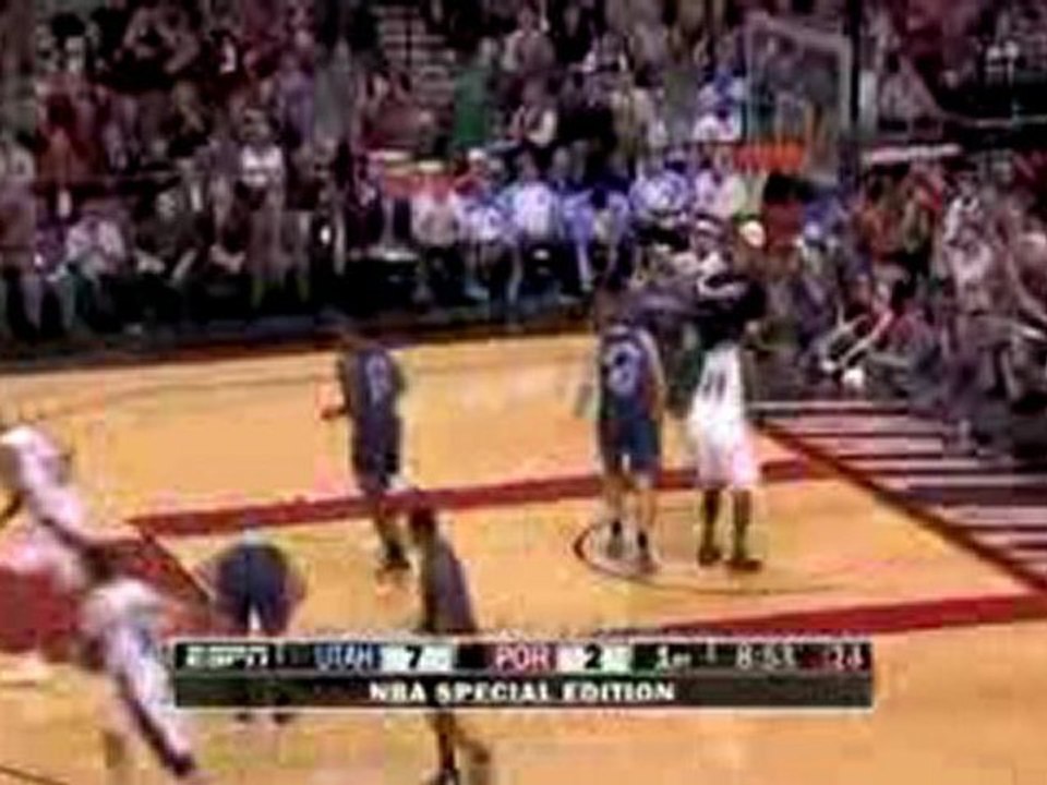 Andre Miller throws a wonderful pass to Martell Webster, who