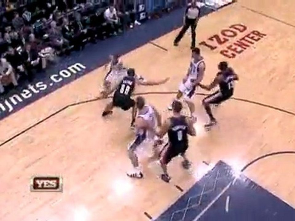 The Nets guard spins in the lane and makes an acrobatic circ