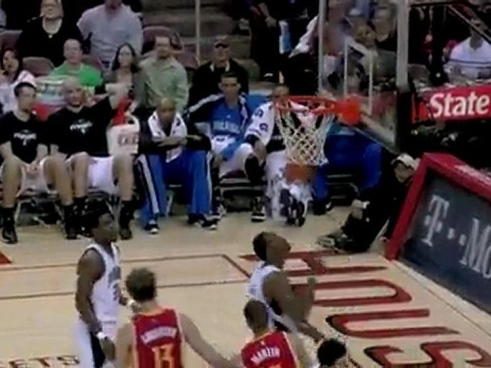 Kevin Martin spins inside on Mickael Pietrus for the layup.