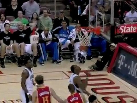 Kevin Martin spins inside on Mickael Pietrus for the layup.