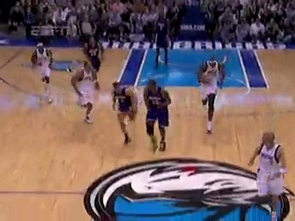 Jordan Farmar contemplates feeding this ball to Kobe but tak