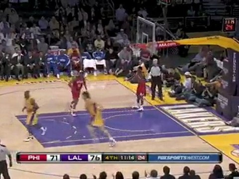 Pau Gasol picks up the loose ball and throws down a one-hand