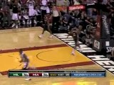 Dorell Wright takes a pass from Michael Beasley and slams it