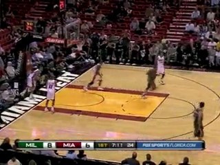 Luc Mbah a Moute takes a pass from Brandon Jenning and rocks