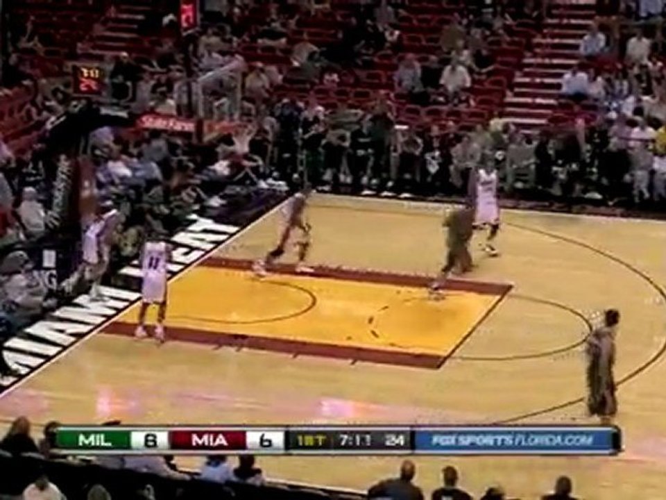 Luc Mbah a Moute takes a pass from Brandon Jenning and rocks