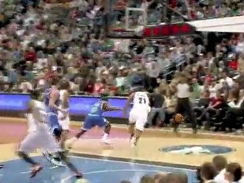 Marcus Camby steals the ball from Jonny Flynn. Andre Miller